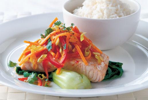 vibrant salmon fillet on greens