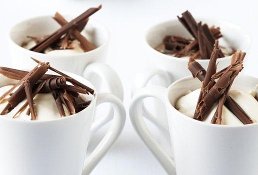 Mugs of decorated hot chocolate